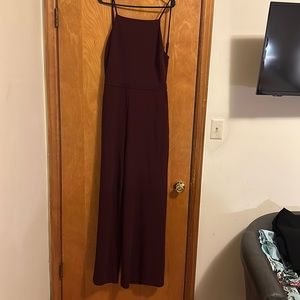 Super cute jumpsuit never been worn size XL from Lulu’s tags still on wine color